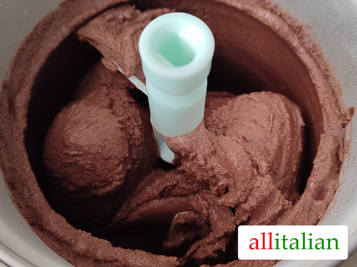 Freshly made chocolate ice cream in an ice cream machine